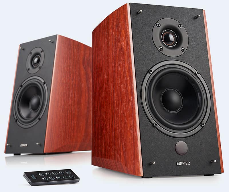 Three quarter view of the Edifier R2000DB speakers with woodgrain finish