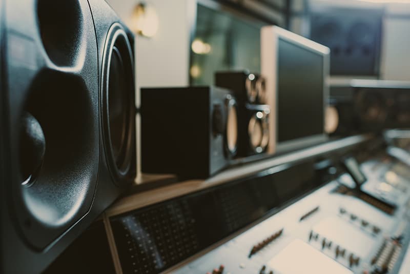 Studio monitors in a music studio.