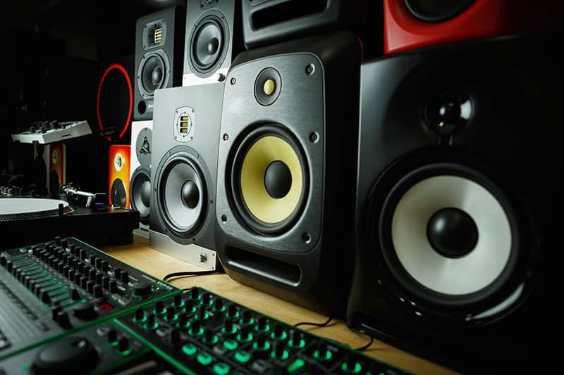 Various studio monitors in a studio.