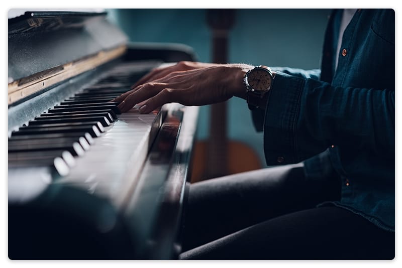 Woman playing a piano.