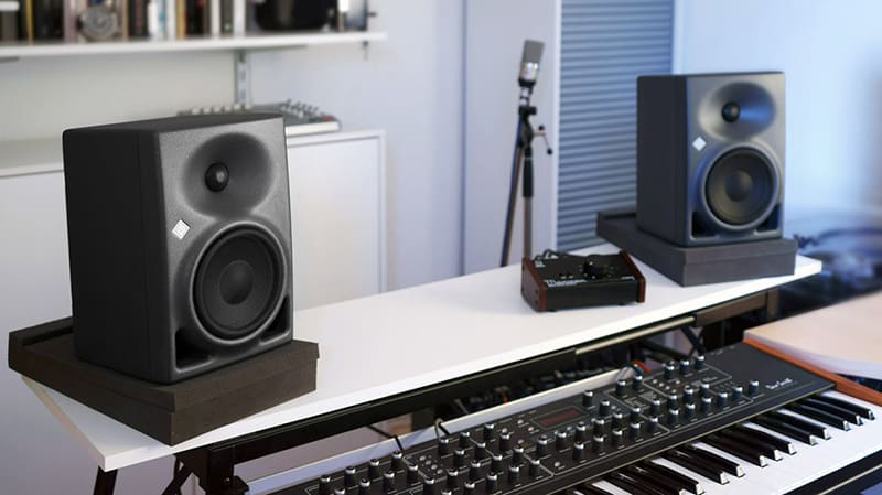 Neumann KH 120 monitors with a keyboard.