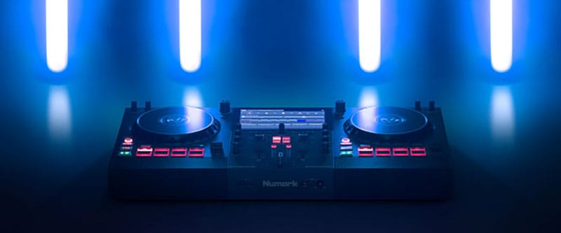 Numark Mixstream Pro with lights in the background.