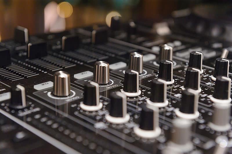 Close-up photo of a 4-channel DJ controller.