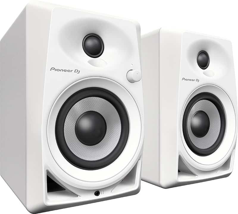 Three quarter view of a pair of the white Pioneer DM-40 studio monitors.