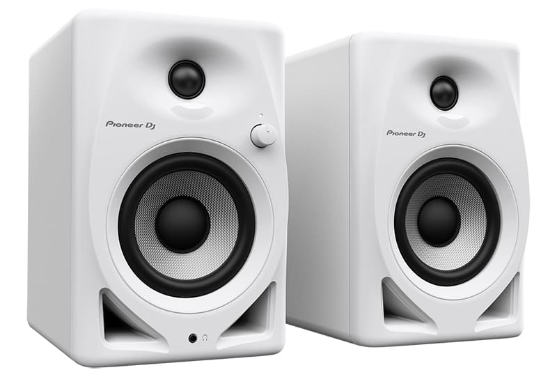 Three quarter view of the white Pioneer DM-40D studio monitors.
