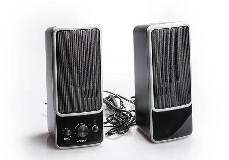 Plain computer speakers isolated on a white background