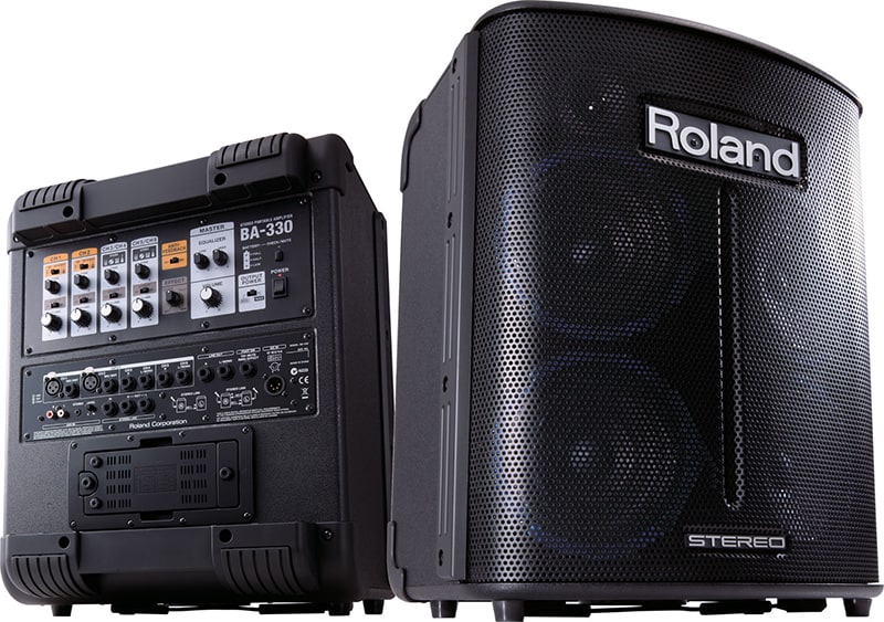 A pair of Roland BA 330 portable PA systems.