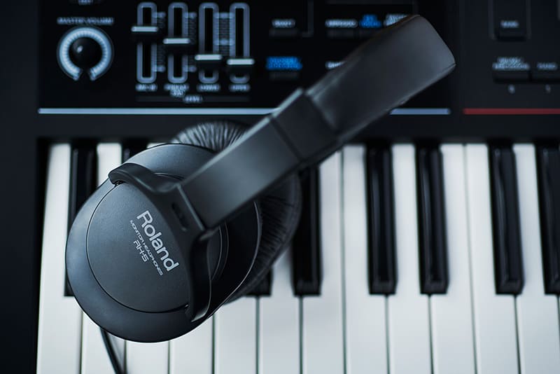 Roland RH-5 sitting on a keyboard.