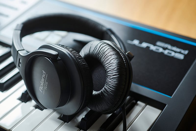 Roland RH-5 sitting on a keyboard.