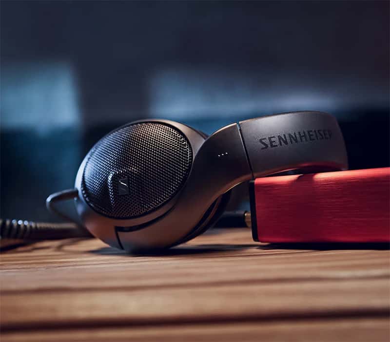 The Sennheiser HD 400 Pro headphones sitting on a desk.