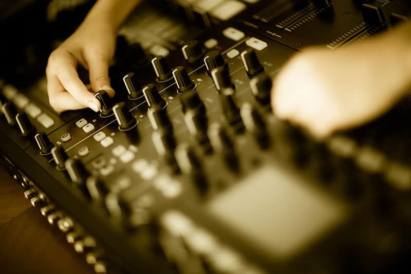 Photo of the central mixer section of a DJ controller