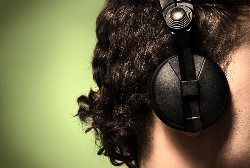 Headphones on a mans head