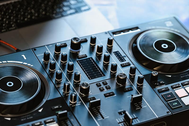 DJ controller connected to a laptop.
