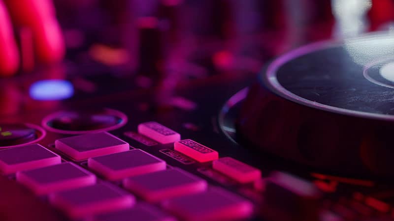 Close-up photo of a DJ controllers buttons.