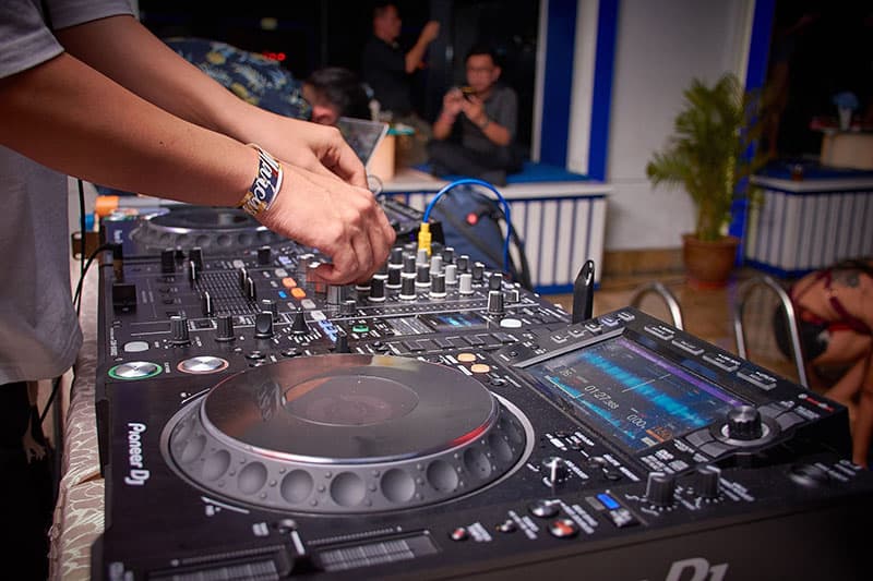 DJ playing at a house party