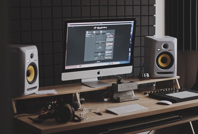 Computer with studio monitors.